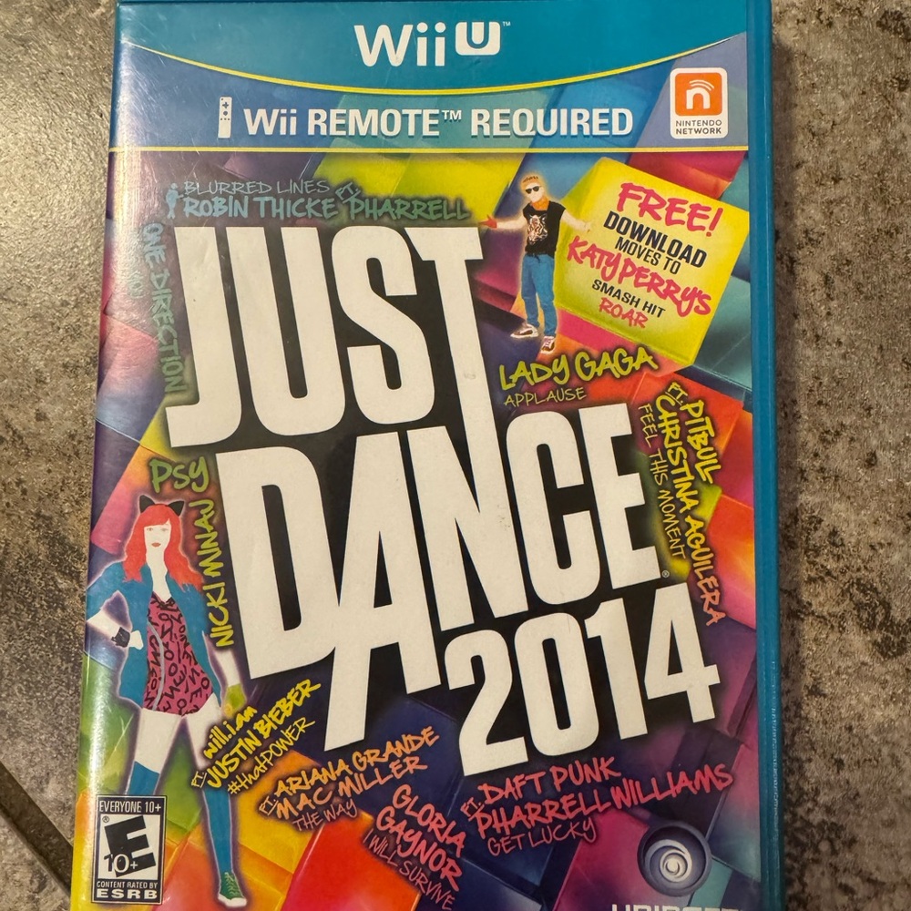 Just Dance 2014 for the Nintendo Wii U. Disc case & manual.